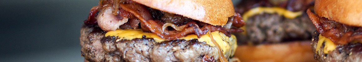 Eating American (Traditional) Burger at La Fiesta Burger restaurant in Visalia, CA.